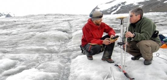 Researchers working on a glacier field