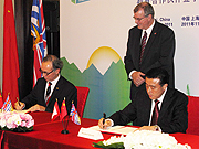 1.	President Iwama and VP Wei, witnessed by Steve Thomson Minister of Forests, Lands, and Natural Resource Operations. 