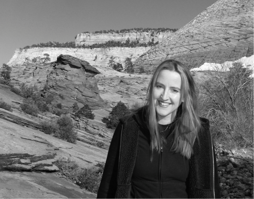 Alice Henderson in front of rock features