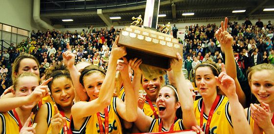 Women's basketball team with provincial trophy