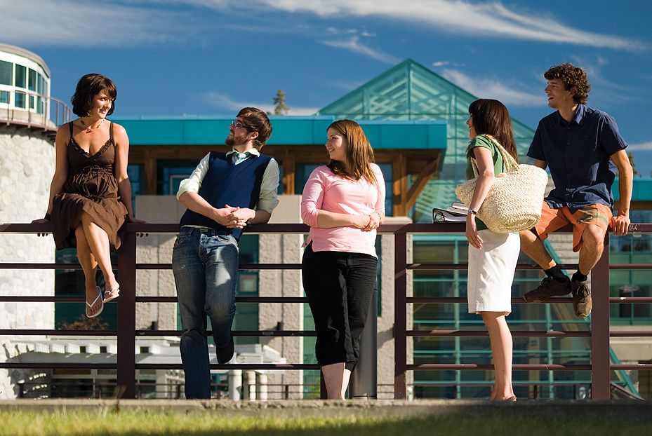 Students leaning on a railing at UNBC's Prince George campus