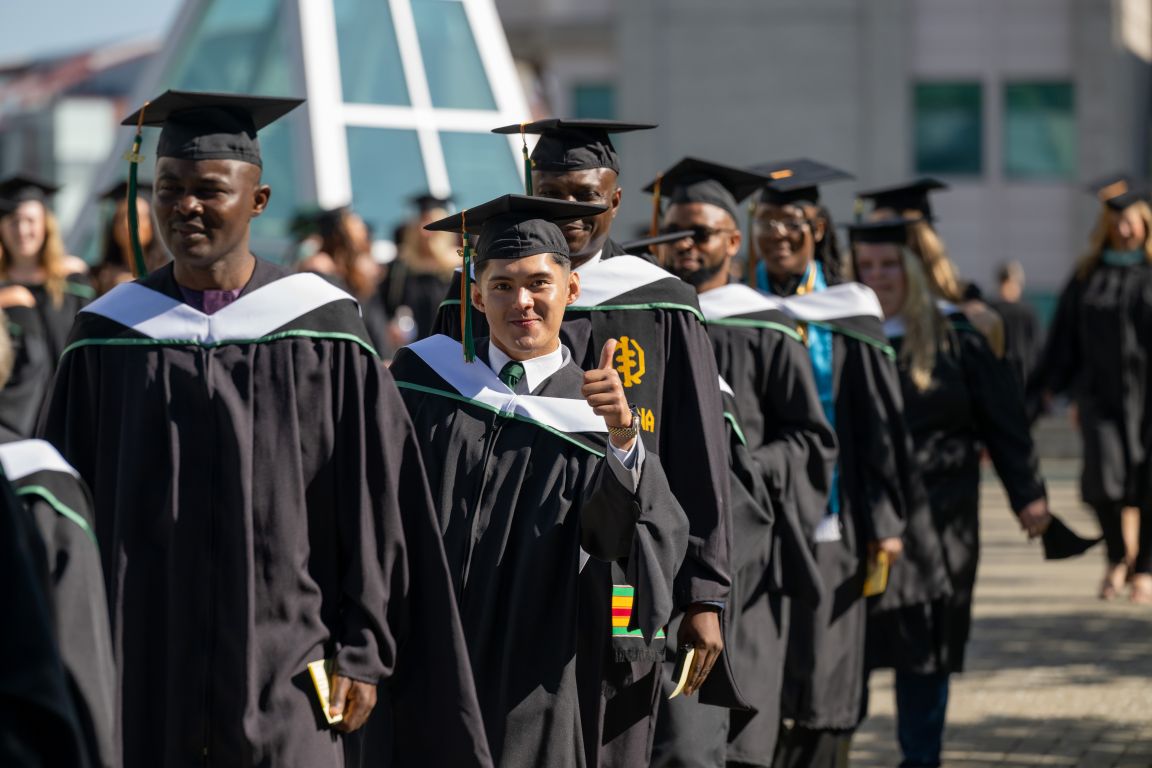 Close up of grad in procession line