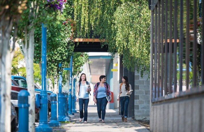 Three students walking in Prince George.