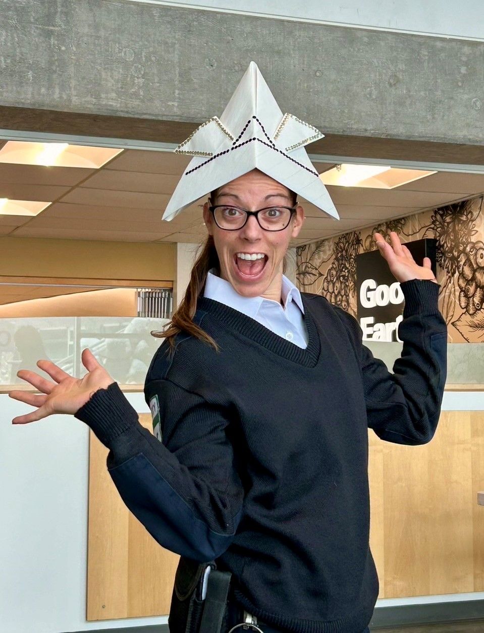 UNBC Security wearing an origami hat