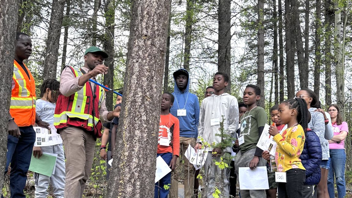 Dr Bartels demonstrating tree coring for BYIS program