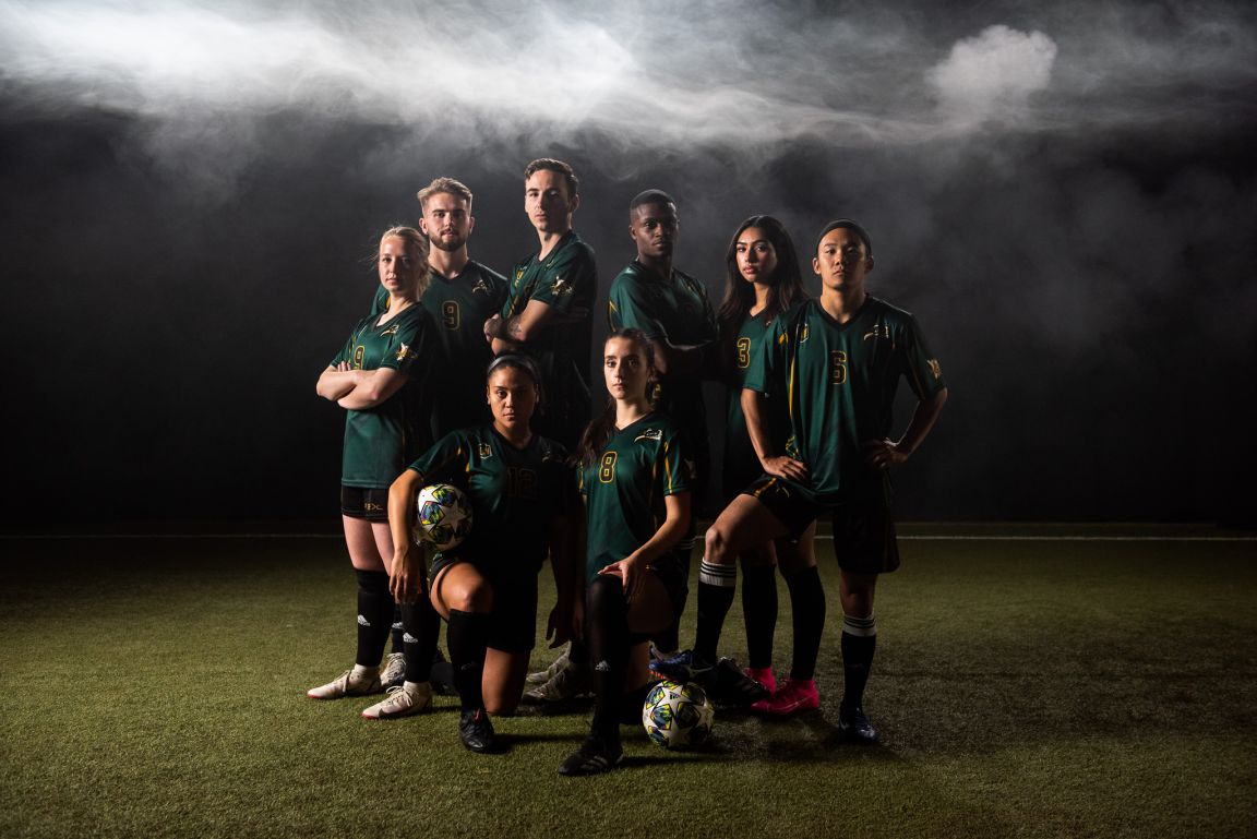 Members from UNBC's men's and women's soccer team wear the alternate jerseys.