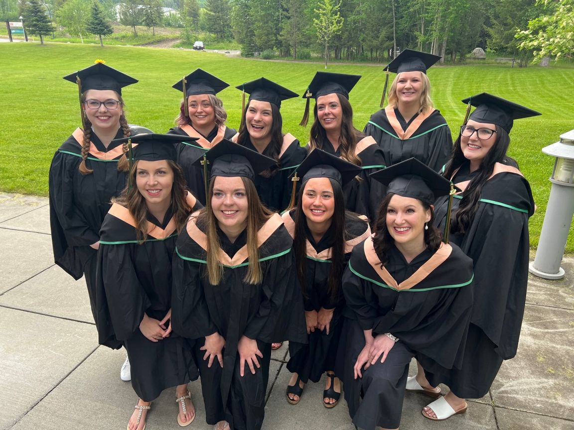 A group of graduates in cap and gown 