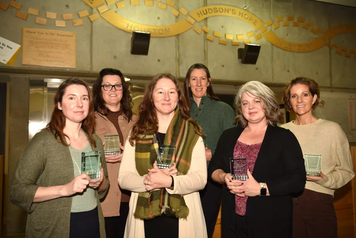 NMP Year 1 and 2 team hold their UBC staff award plaques.