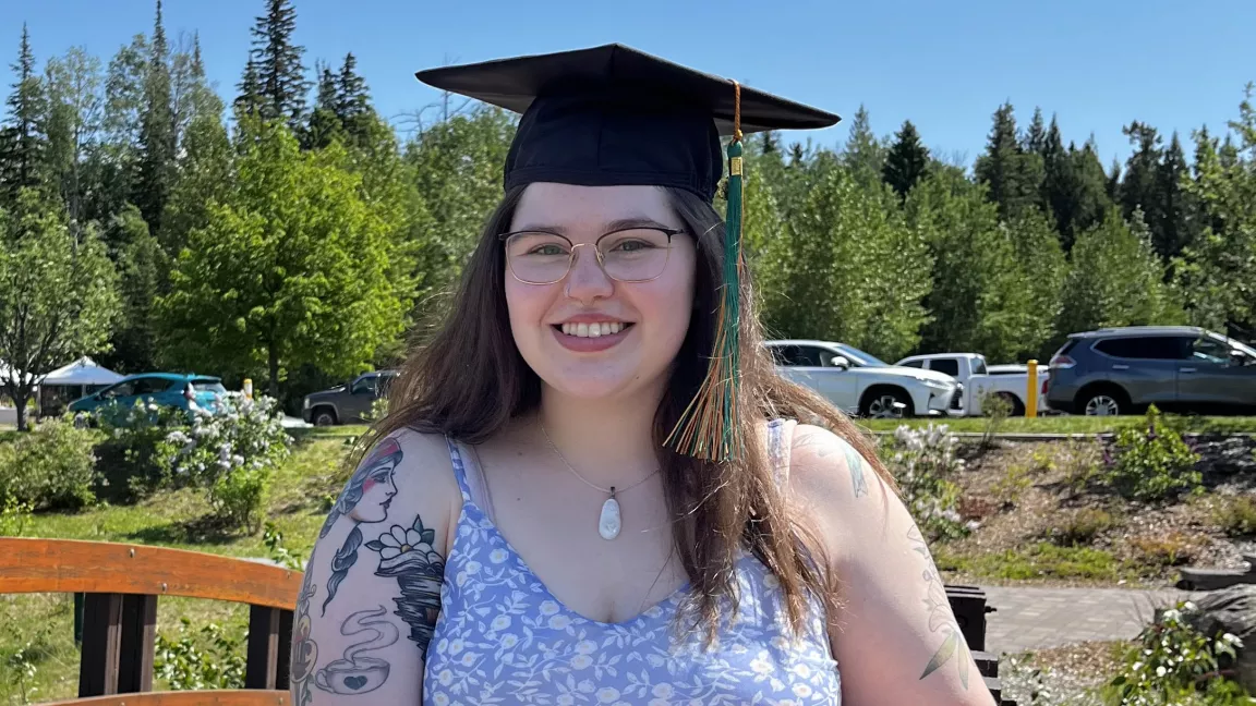 A person wearing a graduation cap