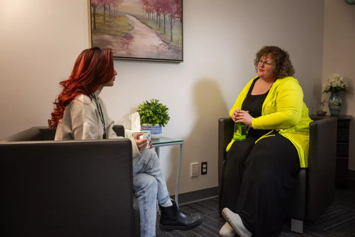 Two women participating in a restorative conversation