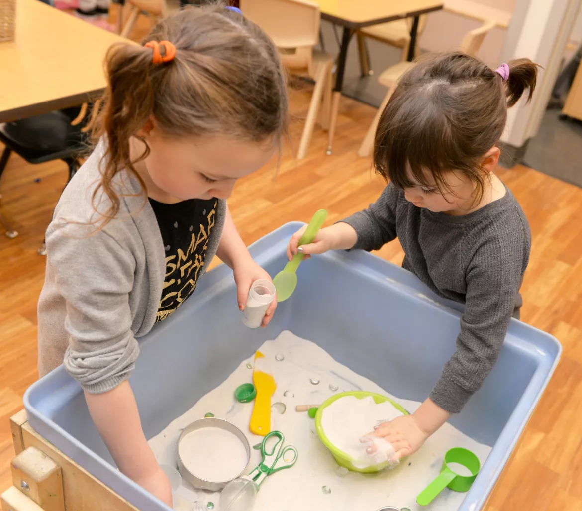 UNBC Childcare boy girl sandbox interior