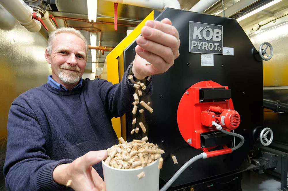 Doug Carter showing us the wood pellets